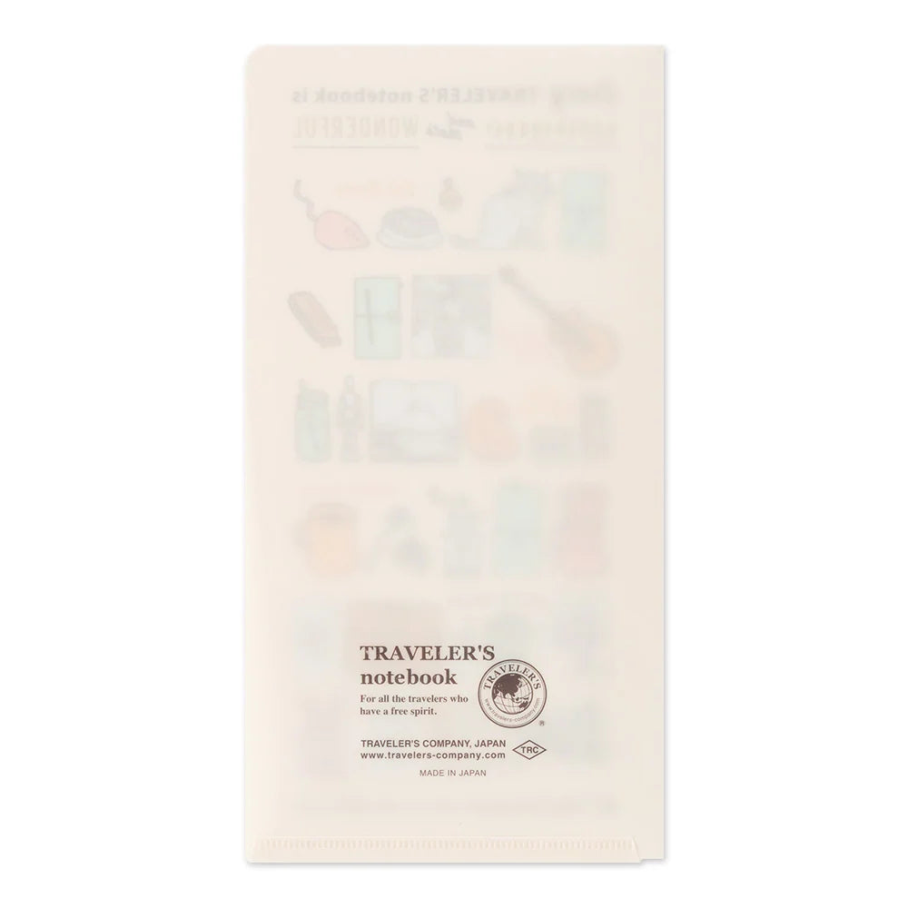 A translucent cream-colored folder with the text 'TRAVELER'S notebook' near the bottom, shown against a plain white background.