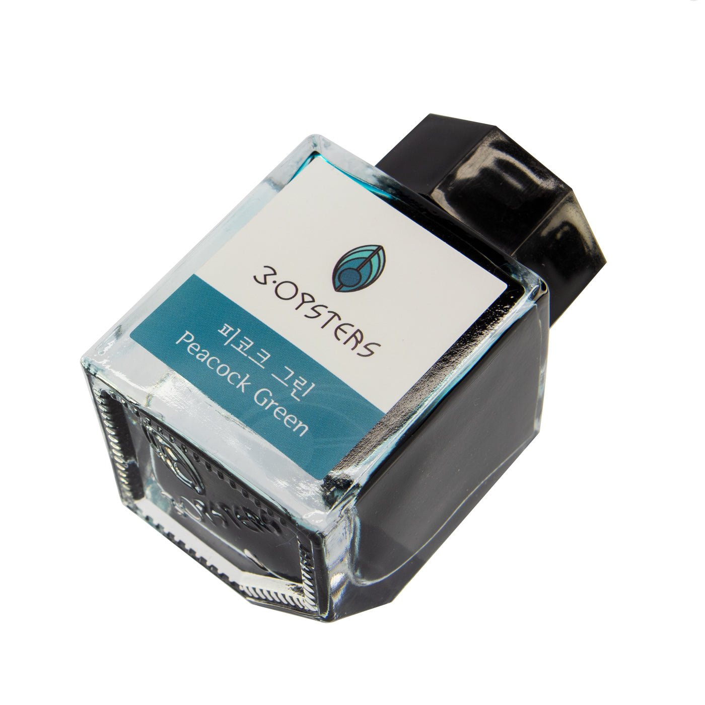 Turquoise green fountain pen ink from 3Oysters ink, made in Seoul, South Korea. these inks are designed for fountain pens. the ink is water based using ionized water and dye-based colors. the colors are rich and deep with low sheen and shading. These inks are for wordsmithing, hand lettering, writing, calligraphy, drawing, and art. Not waterproof