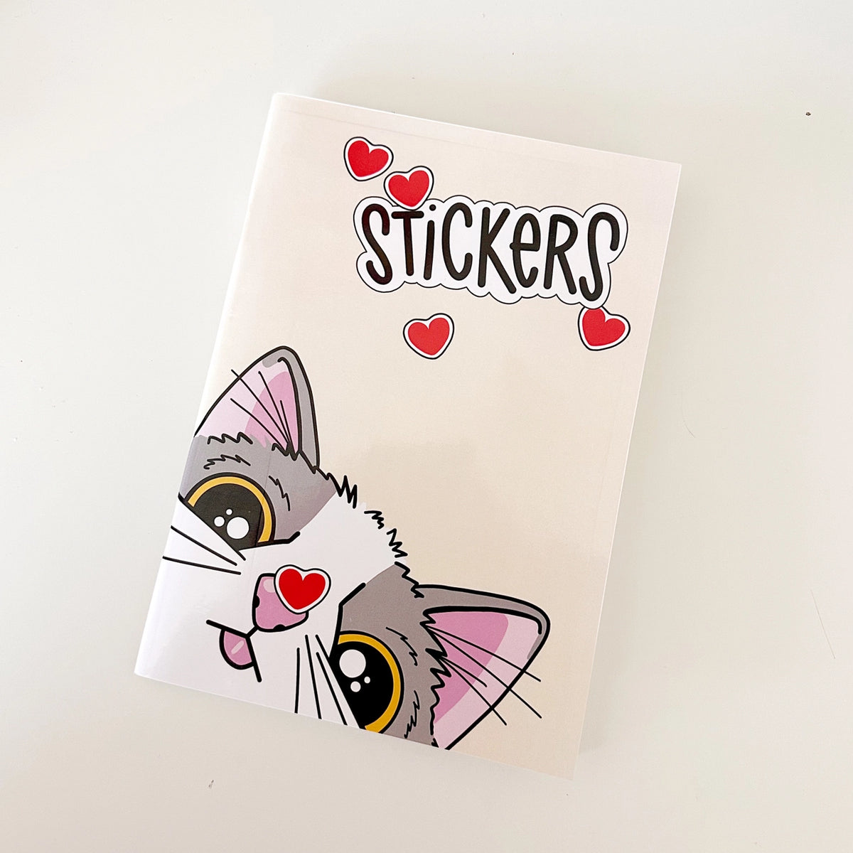 Calliope Pencil Factory - Reusable Sticker Book - Chips the Cat