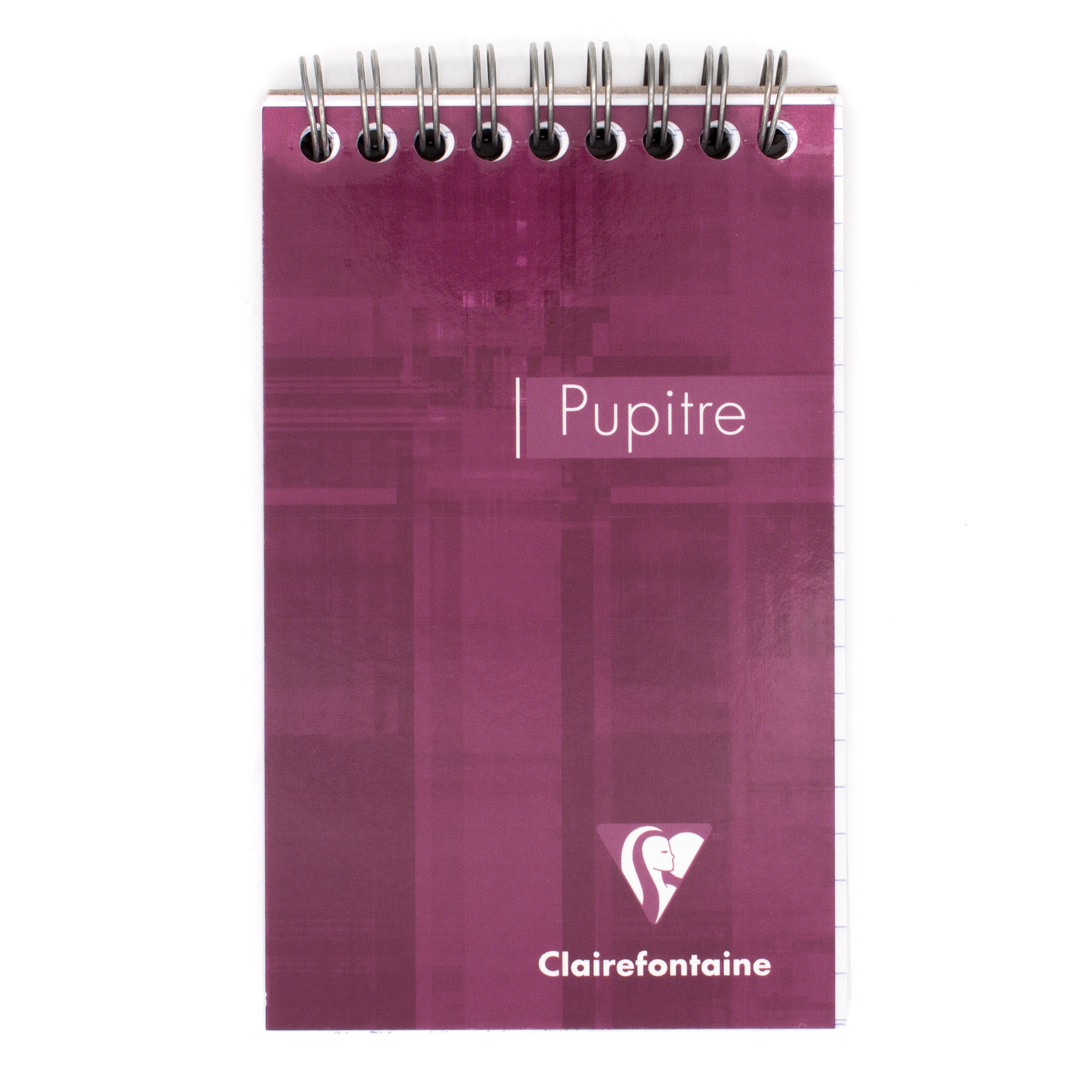A plum top wire bound notepad with text that says 'Pupitre' and the Clairefontaine logo located in the bottom right corner of the cover. 