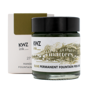 30 ml bottle of KWZ 'All That Matters' olive permanent ink in front of the product box with a white background.