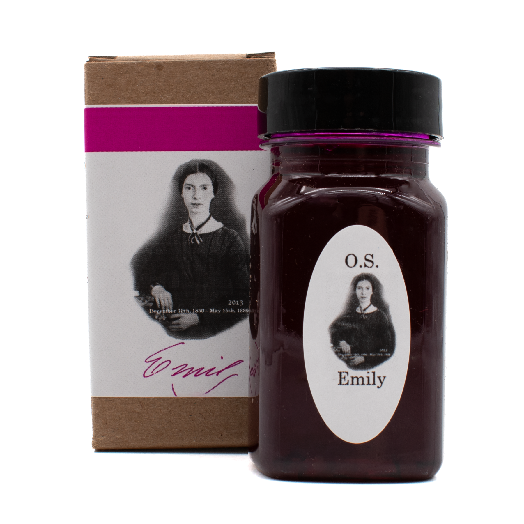 A bottle of Organics Studio 'Emily Dickinson Posie Pink' in front of its brown box with a white and magenta label and a black and white portrait on a white background.