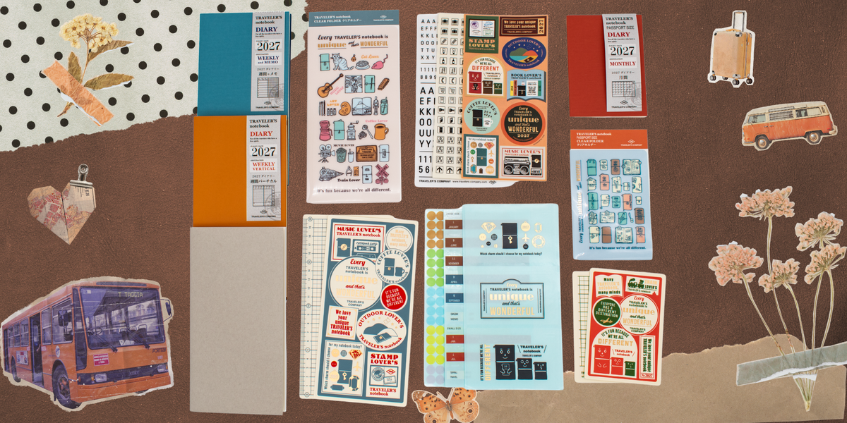 A flat-lay display of various sticker sheets, planner inserts, and decorative paper cutouts featuring retro travel-themed designs, including a bus, van, flowers, and vintage labels, arranged on a brown textured background.