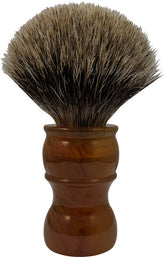 This brush offers extraordinary performance at an incredible price. Soft tips and a firm backbone offer a truly incredible experience. A large handle gives an extremely comfortable grip and the overall height make whipping up loads of lather in a bowl or scuttle a pleasure.  Bristle material: pure badger hair Height: 4.5" Knot size: 24mm Soft and flexible with a firm backbone Made in England.