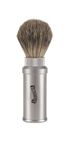 Travel in style with a brushed aluminum cased travel shave brush. Bristles thread into case making a man sized shave brush. Pure badger hair bristle work up mountains of lather quickly.  Bristle material: Pure badger hair.  Height: 5 1/2"  Knot size: 21 mm