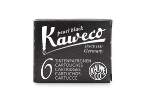 Kaweco Pearl Black is a classic cool black fountain pen ink with low black sheen. It dries in 20 seconds in a medium nib on Rhodia and has an average flow. Kaweco ink is made in Germany
