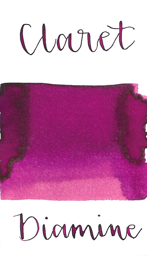 Diamine Claret is a bright magenta pink fountain pen ink with low shading.