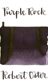 Robert Oster Purple Rock is a dark violet fountain pen ink with medium shading and a pop of red sheen in large swabs.